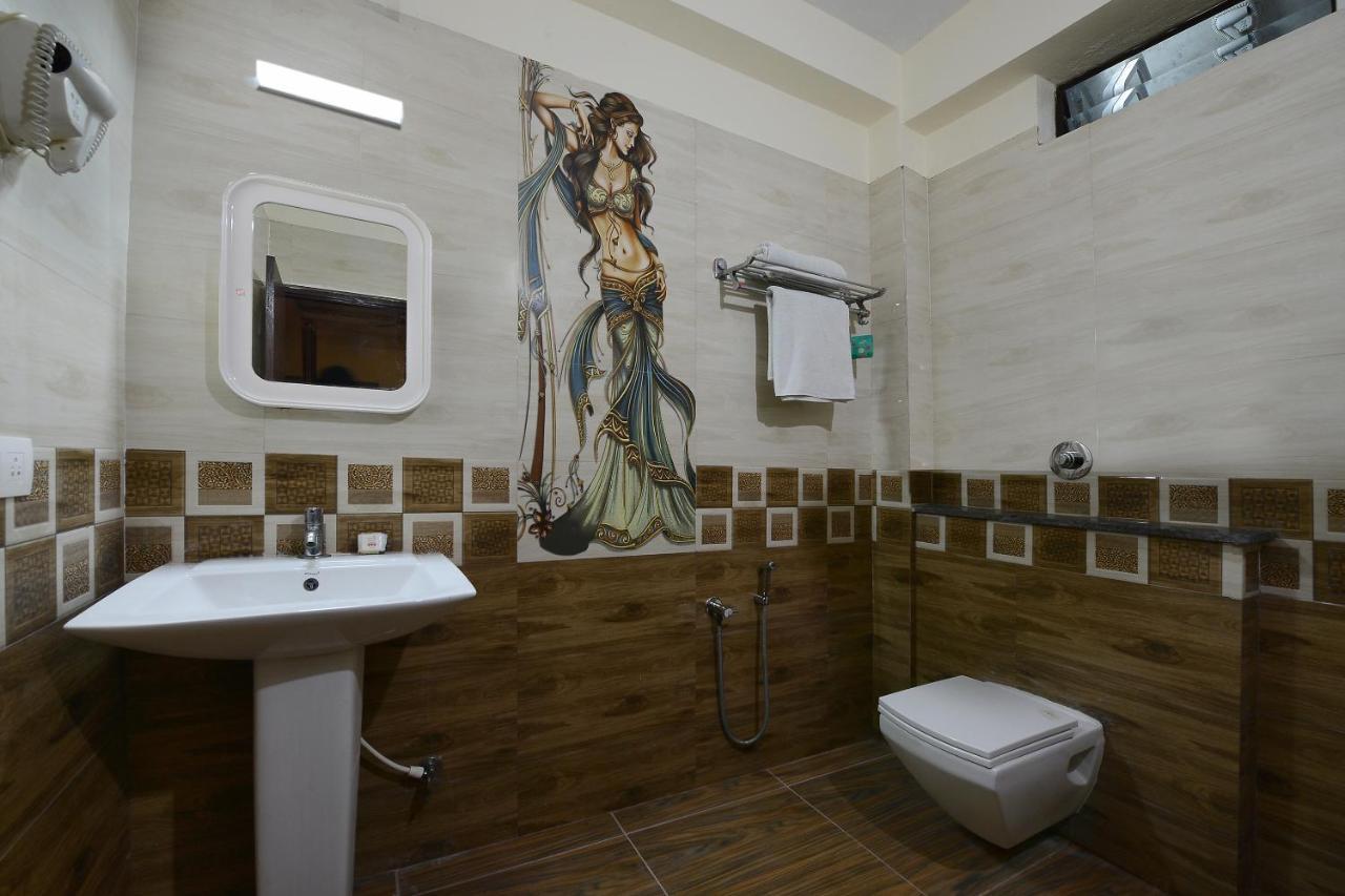 Capital O Hotel Samanvi International Belur  Zewnętrze zdjęcie
